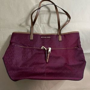 Maroon and brown leather canvas tote bag with MK logo